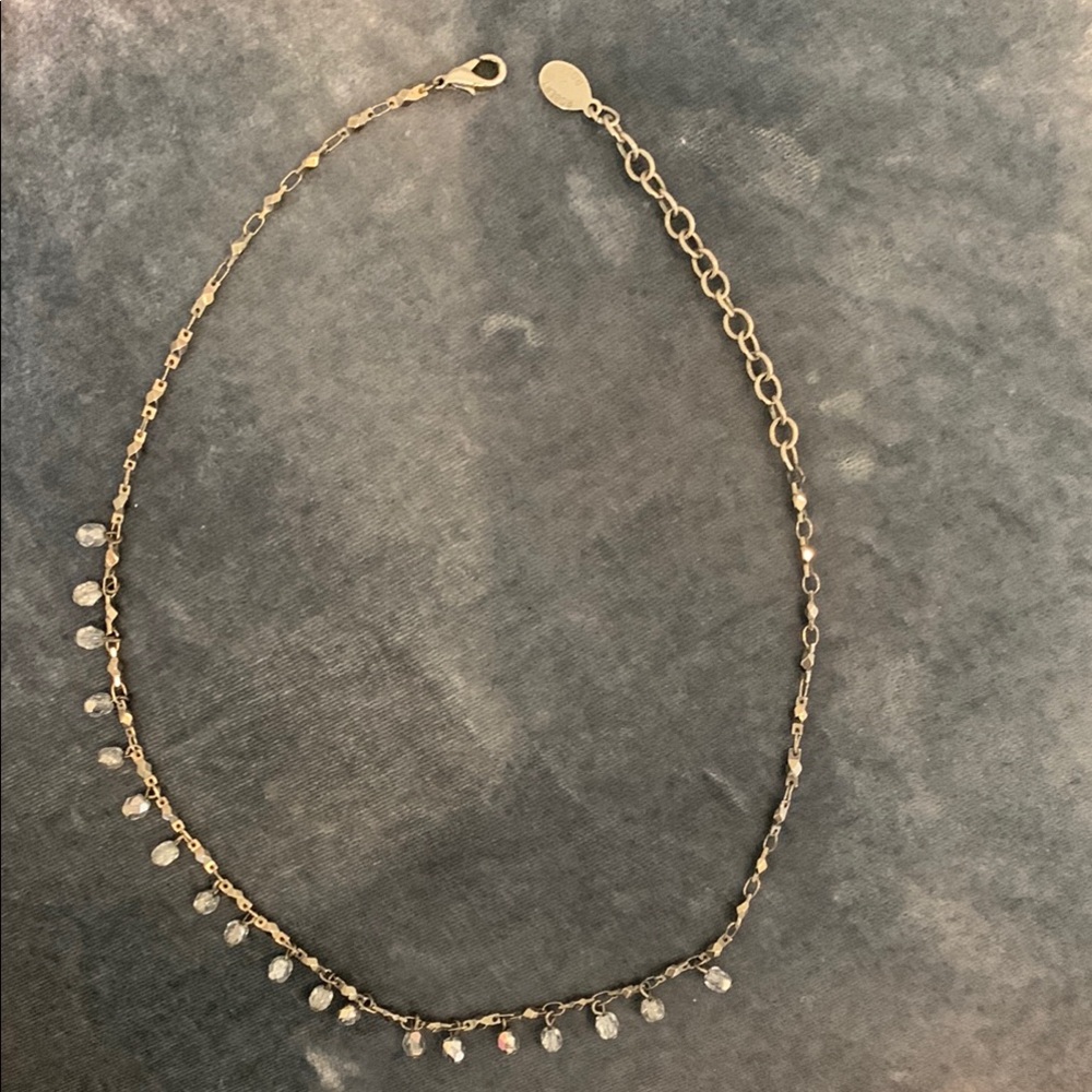 Elegant Robert Rose Necklace with Clear Accents.